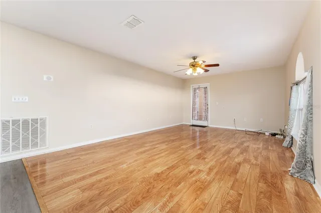 a view of a livingroom with a ceiling fan