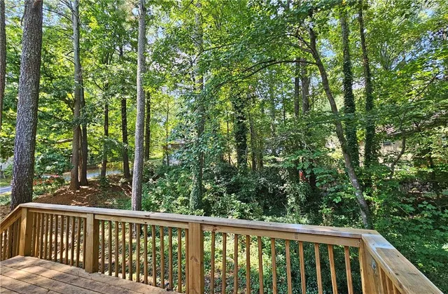 a view of a house with a tree