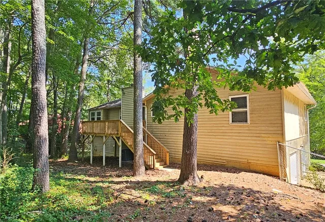a view of swimming pool with a yard