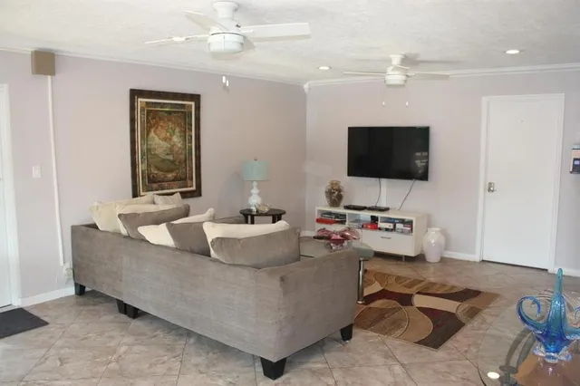 a swimming pool with outdoor seating yard and patio