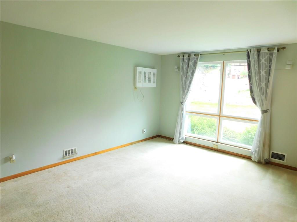 120 Thomas Road McMurray, PA 15317 - Photo 6 of 20 Large living room window lets in a lot of natural light.
