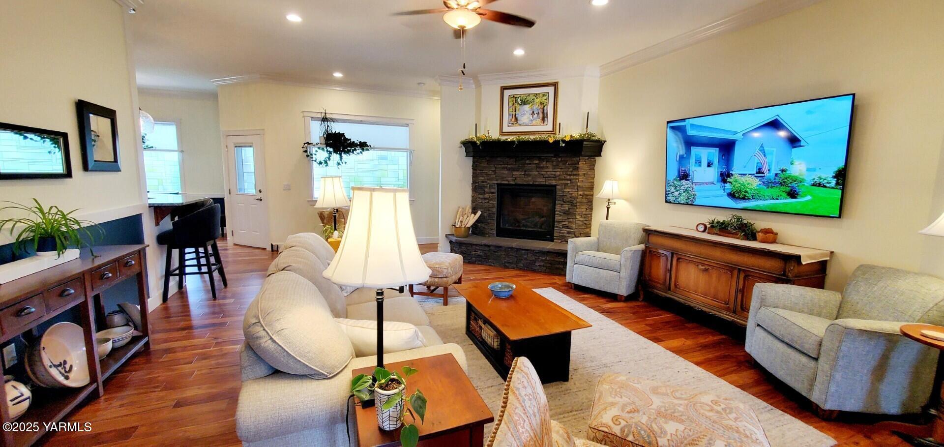 7106 Vista Ridge Avenue Yakima, WA 98903 - Photo 5 of 43 a living room with furniture and a fireplace