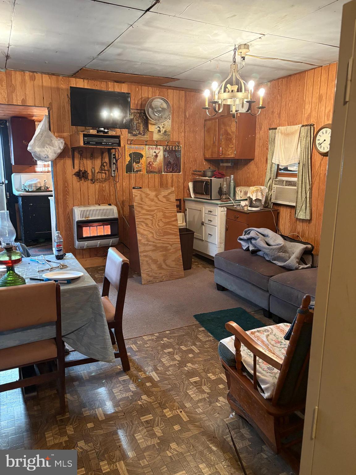 5345 Fowler Hollow Road Blain, PA 17006 - Photo 3 of 9 a living room with lots of furniture and chandelier