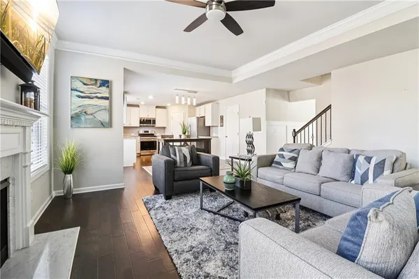 a living room with furniture or couch and a flat screen tv
