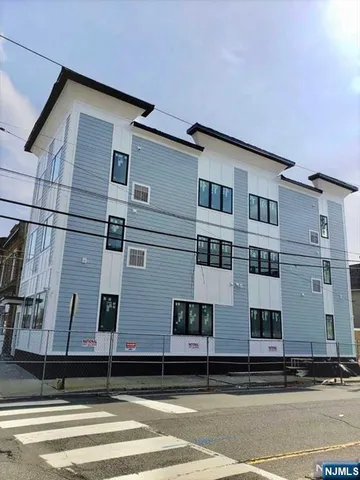 a view of a building with a street