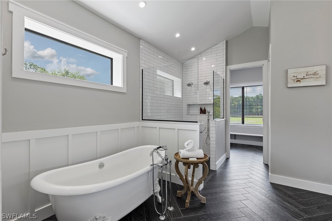 5400 Dana Road Fort Myers, FL 33905 - Photo 17 of 35 a bathroom with a bathtub and a sink