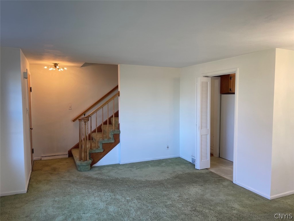 229 Willumae Drive Syracuse, NY 13208 - Photo 15 of 30 Dining/Living area facing front door and staircase