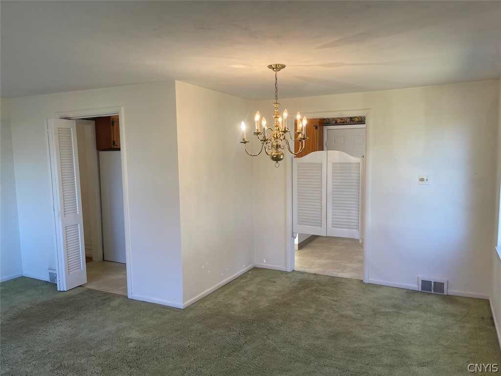 229 Willumae Drive Syracuse, NY 13208 - Photo 16 of 30 Dining/Living area facing kitchen
