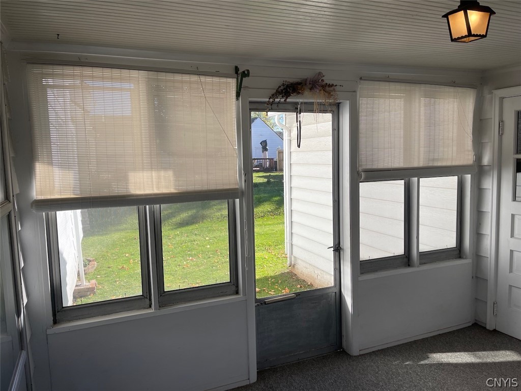 229 Willumae Drive Syracuse, NY 13208 - Photo 7 of 30 Interior of porch facing back yard