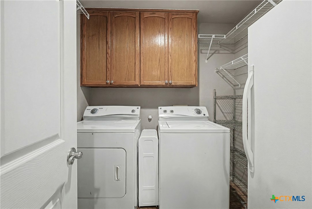 1601 Sunset Circle Cameron, TX 76520 - Photo 31 of 40 a utility room with dryer and washer