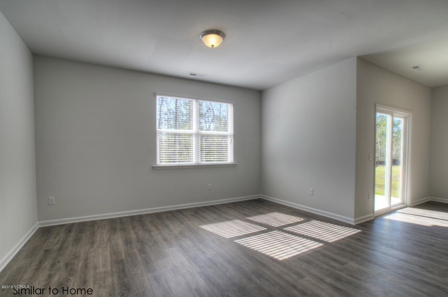604 Saltree Circle, Unit 104 Holly Ridge, NC 28445 - Photo 5 of 21 Cali-large-008-9-Living Room
