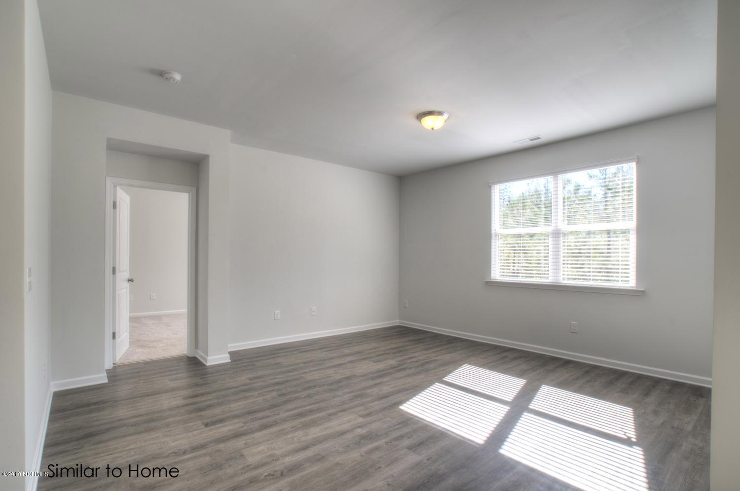 604 Saltree Circle, Unit 104 Holly Ridge, NC 28445 - Photo 6 of 21 Cali-large-007-7-Living Room