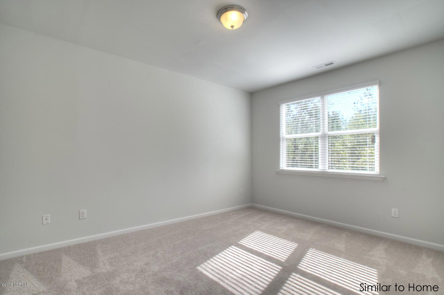604 Saltree Circle, Unit 104 Holly Ridge, NC 28445 - Photo 7 of 21 Cali-large-009-11-Master Bedroomb