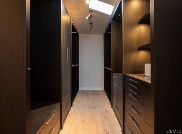 a bathroom with a double vanity sink and mirror