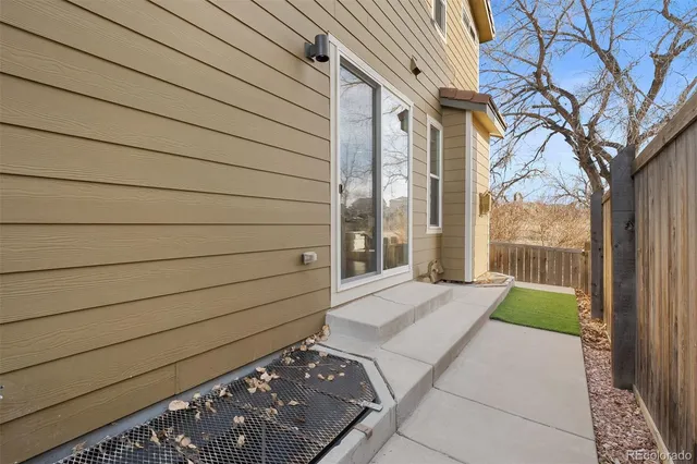 a view of a backyard of the house