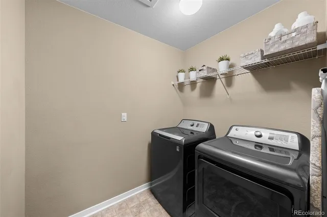 a en suite bathroom with a sink mirror and vanity