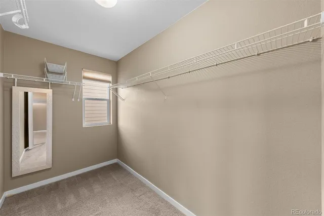 a view of a storage room with stairs