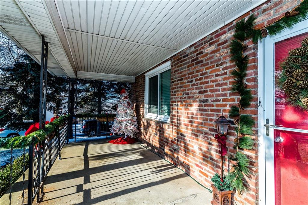 398 Moon Clinton Road Coraopolis, PA 15108 - Photo 2 of 25 Covered front porch off large front lawn