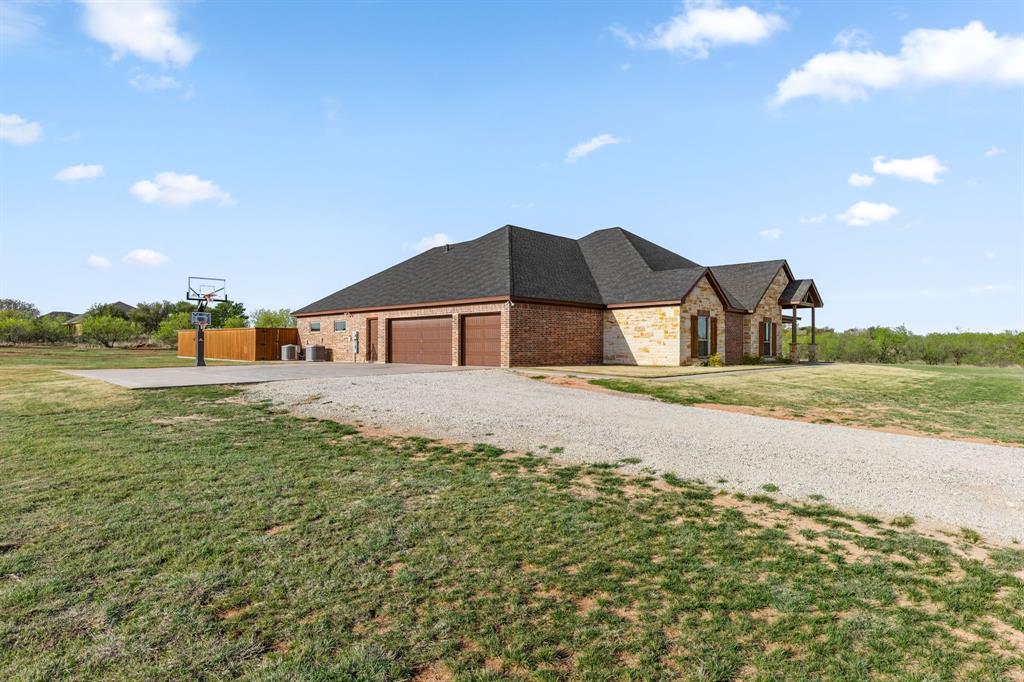 515 Sales Road Windthorst, TX 76389 - Photo 2 of 34 a house view with a outdoor space