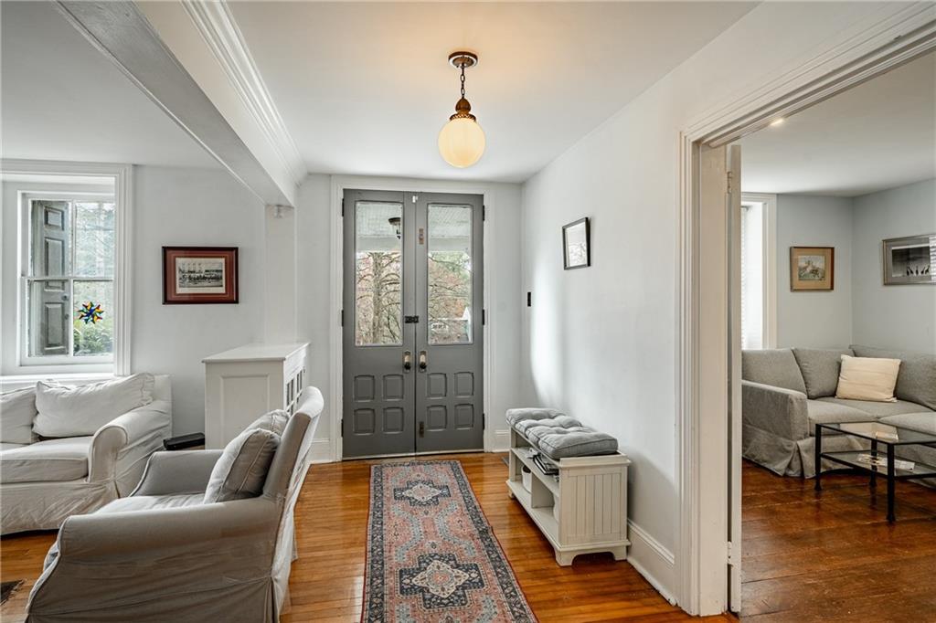 701 Oakbourne Road West Chester, PA 19382 - Photo 3 of 50 a living room with furniture and a wooden floor
