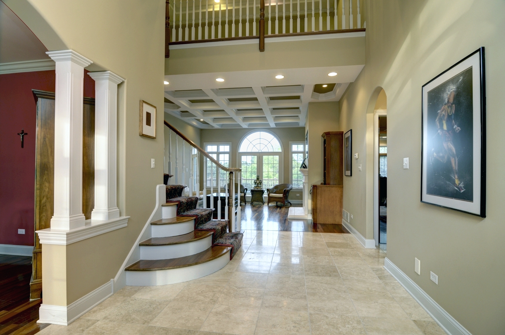 510 Rookery Lane Joliet, IL 60431 - Photo 2 of 40 a view of a hallway with living room and chandelier