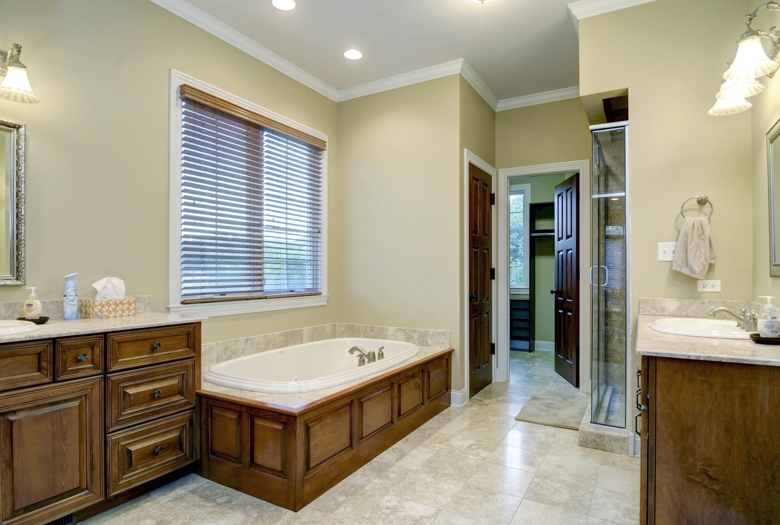 510 Rookery Lane Joliet, IL 60431 - Photo 15 of 40 a bathroom with a tub sink and mirror