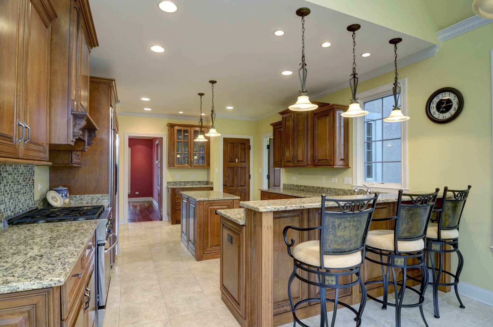 510 Rookery Lane Joliet, IL 60431 - Photo 19 of 40 a kitchen with stainless steel appliances granite countertop a stove and a cabinets