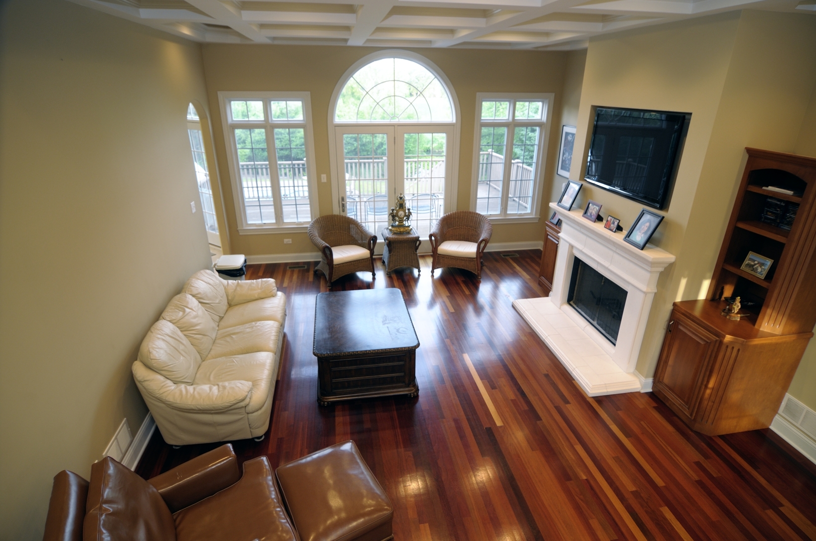 510 Rookery Lane Joliet, IL 60431 - Photo 22 of 40 a living room with furniture a fireplace and a flat screen tv