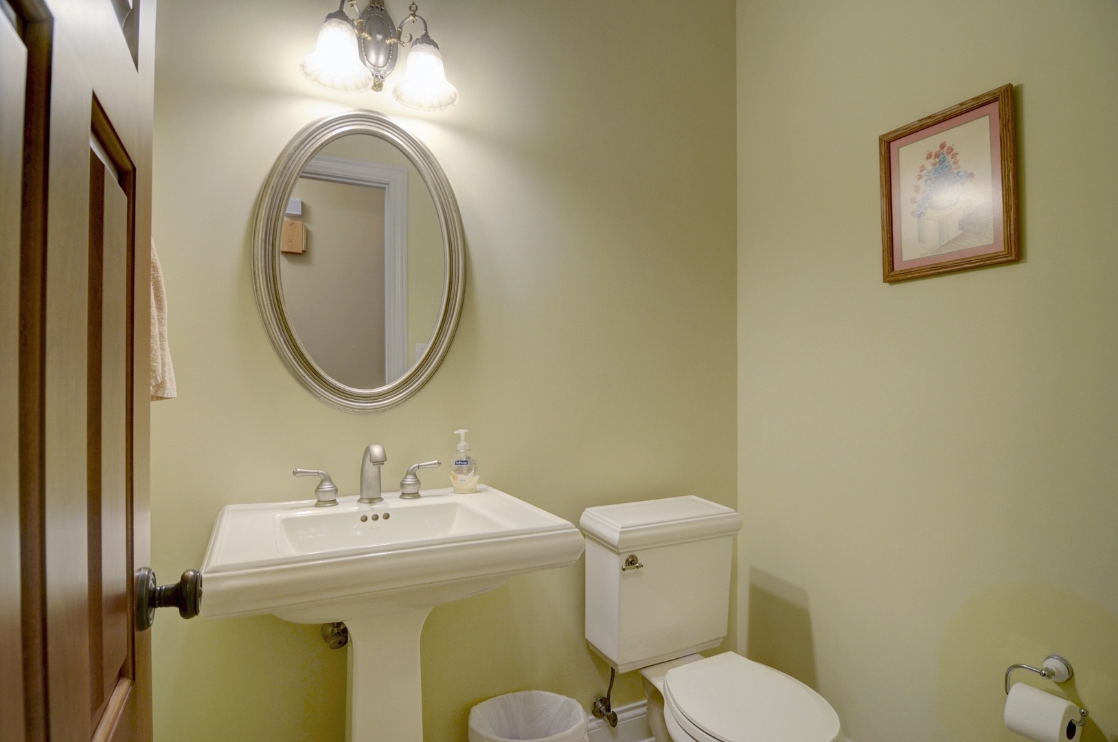 510 Rookery Lane Joliet, IL 60431 - Photo 26 of 40 a bathroom with a toilet sink and mirror