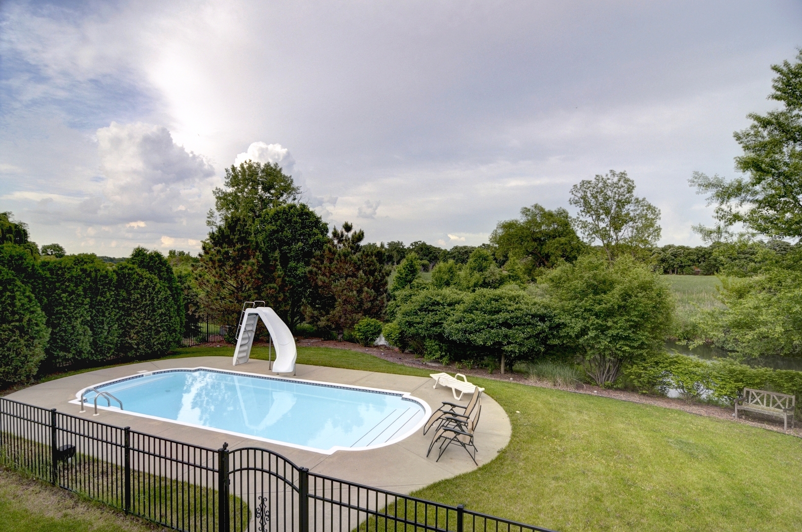 510 Rookery Lane Joliet, IL 60431 - Photo 38 of 40 a view of roof deck with chair and wooden fence