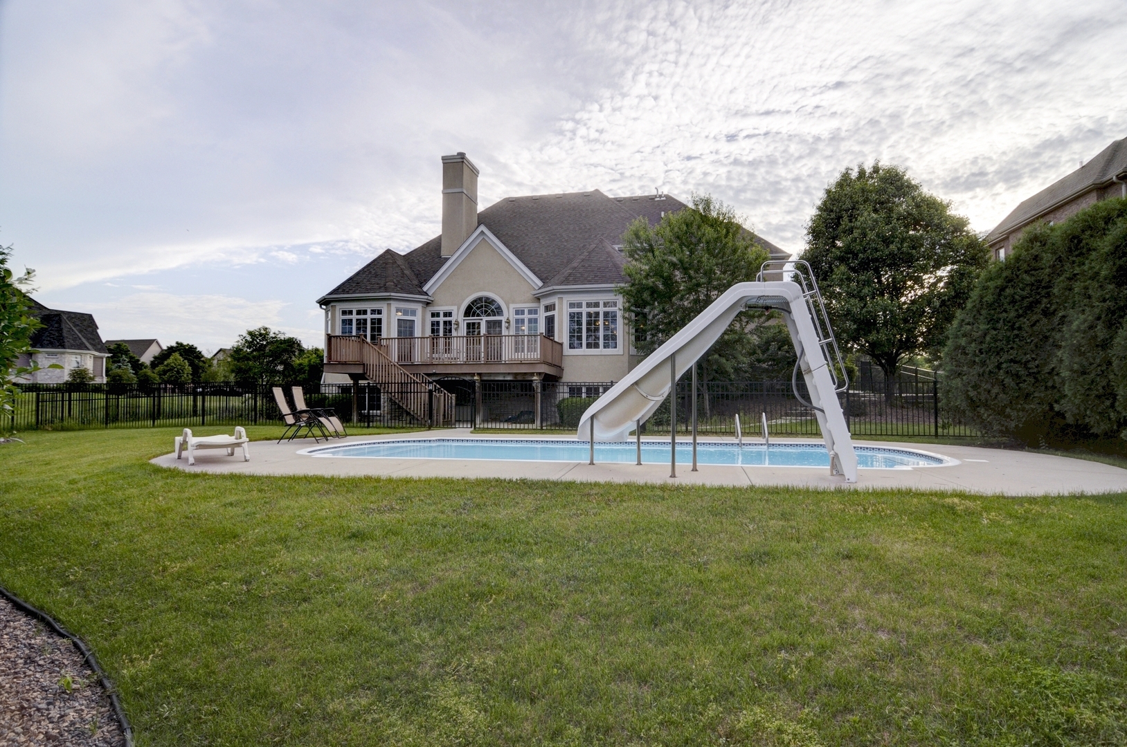 510 Rookery Lane Joliet, IL 60431 - Photo 40 of 40 a view of a house with a swimming pool and a yard