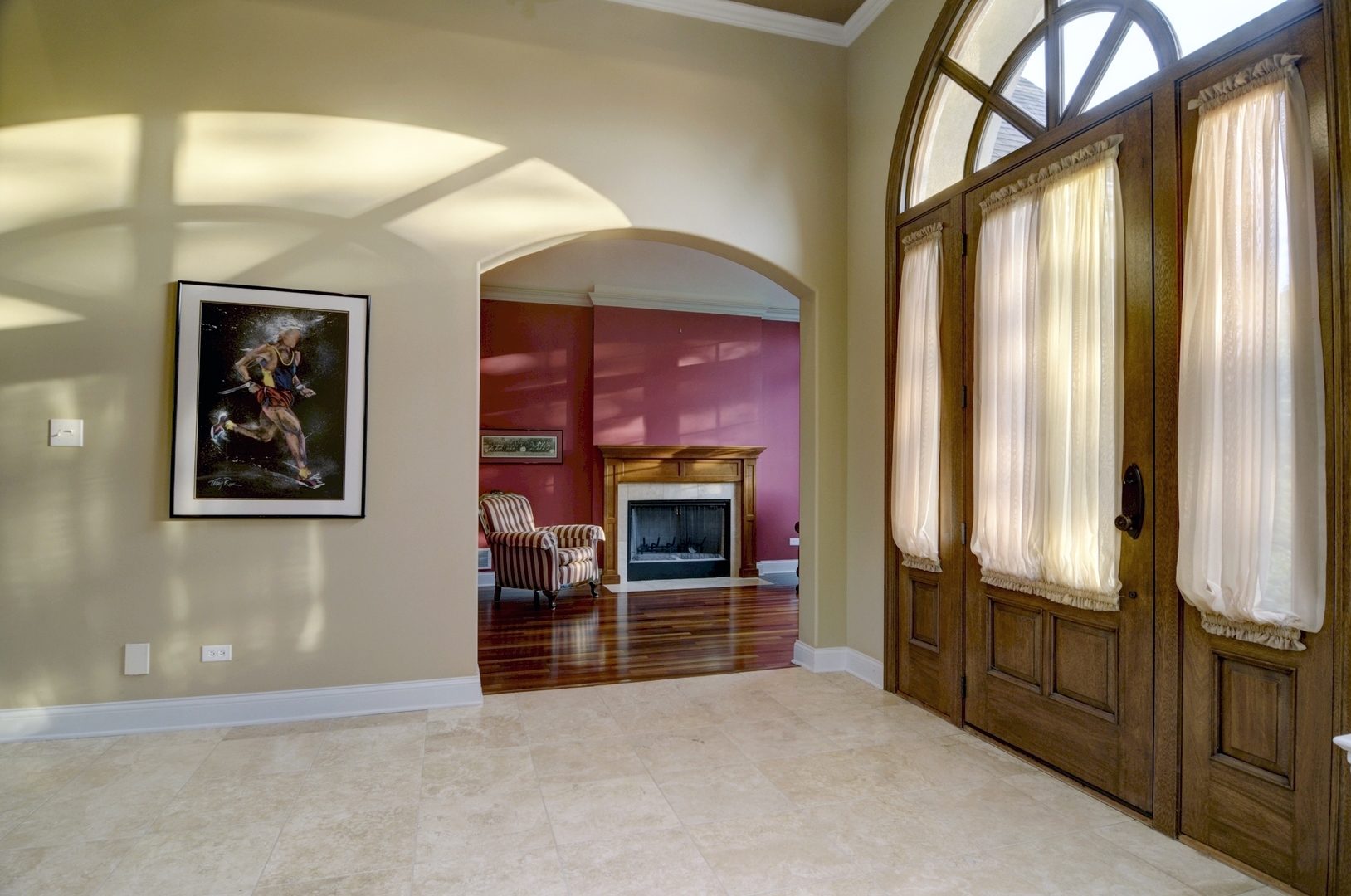 510 Rookery Lane Joliet, IL 60431 - Photo 6 of 40 an empty room with windows fire place and an entryway