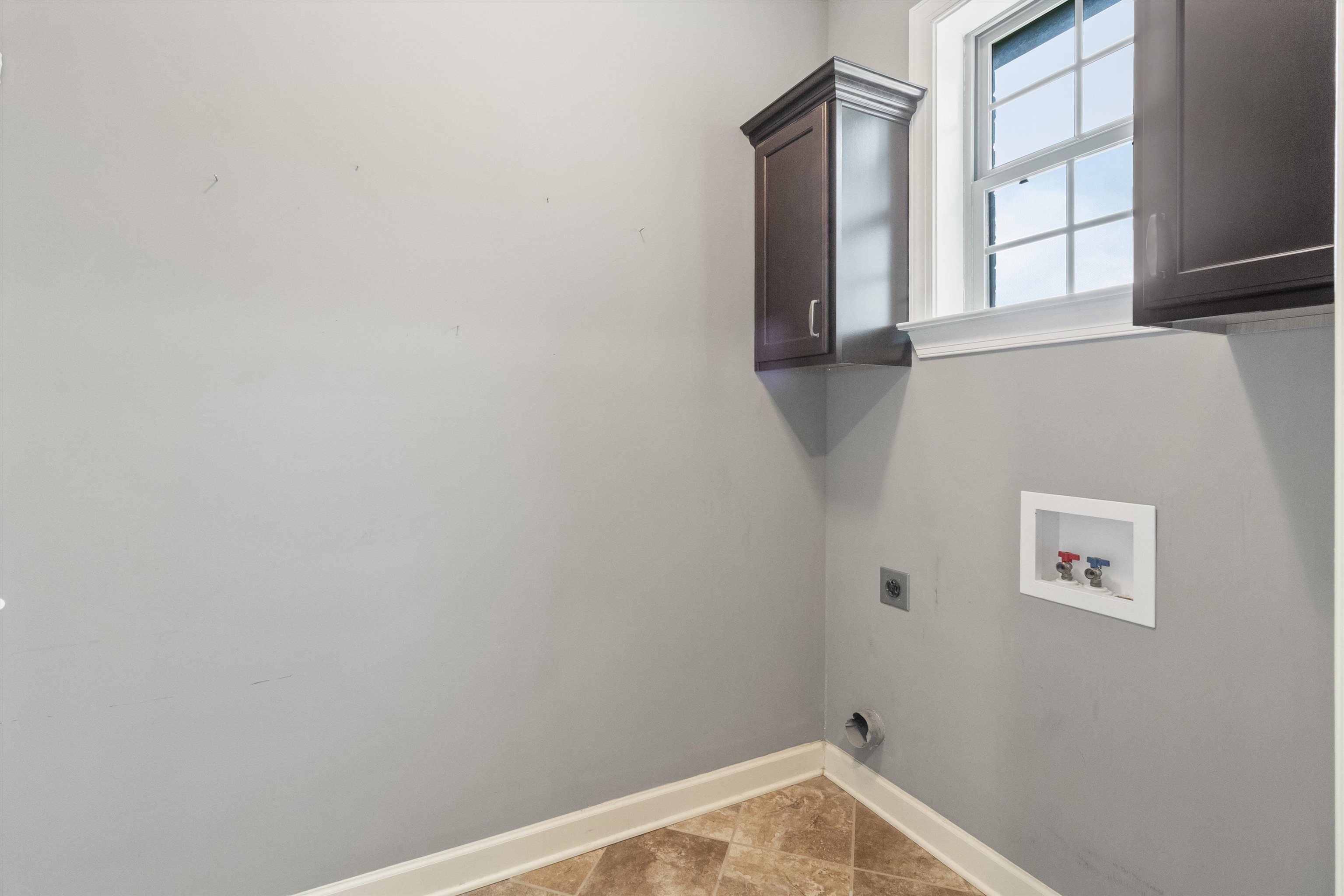 3449 Banyan Lane Bartlett, TN 38133 - Photo 17 of 35 a view of a small space with window and refrigerator