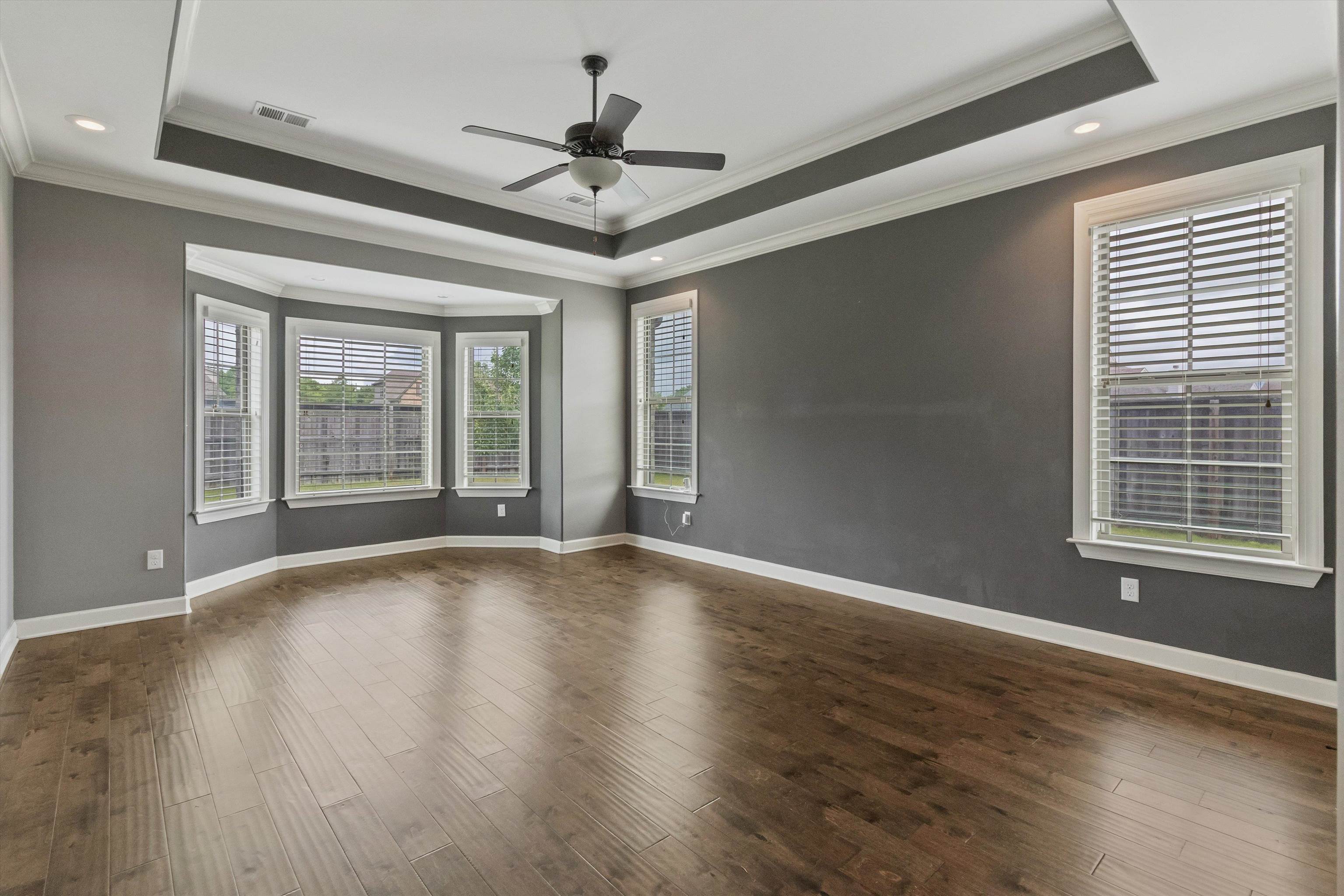 3449 Banyan Lane Bartlett, TN 38133 - Photo 19 of 35 a view of an empty room with wooden floor and a window
