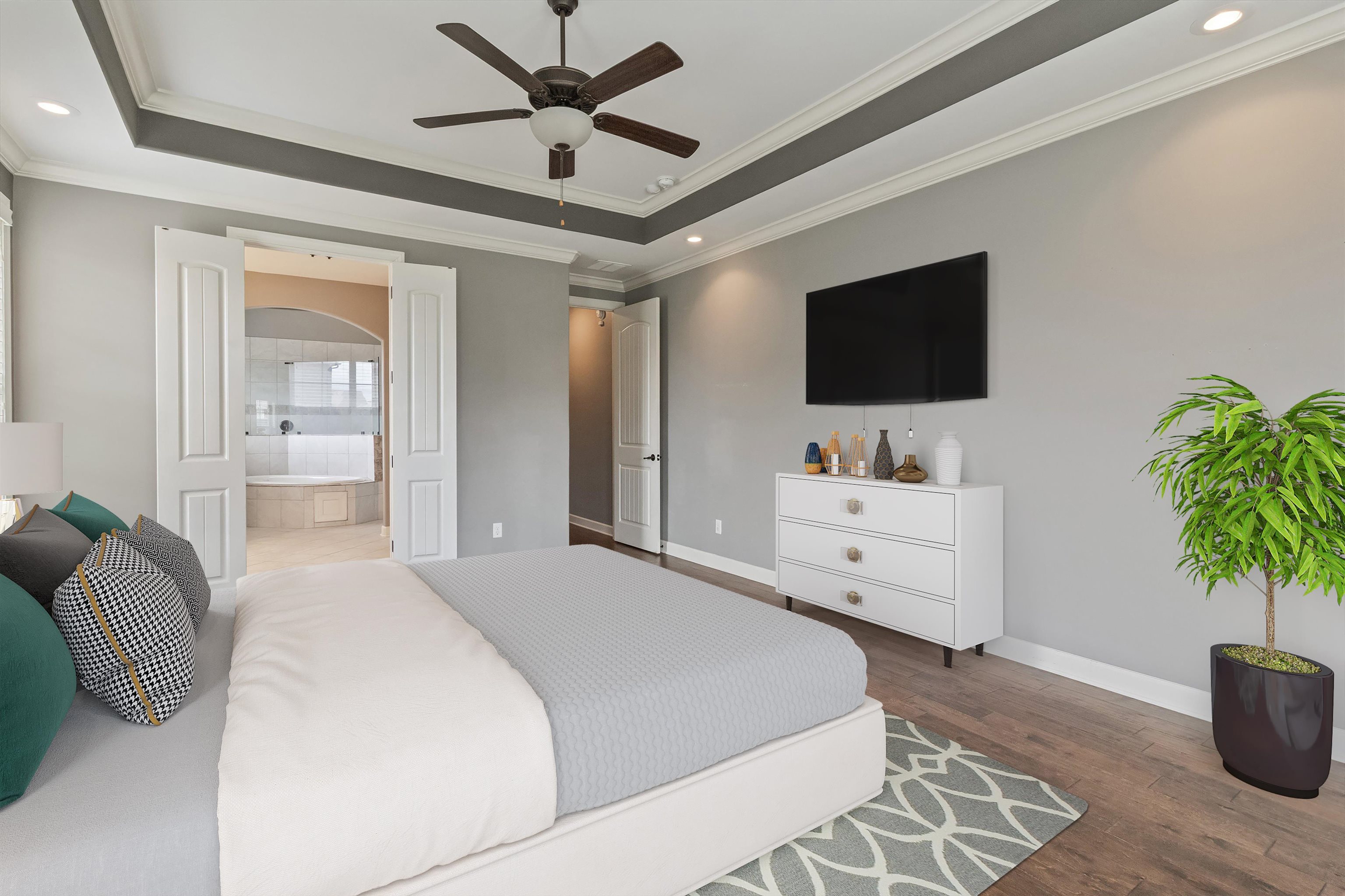 3449 Banyan Lane Bartlett, TN 38133 - Photo 22 of 35 a bedroom with a large bed and a flat screen tv