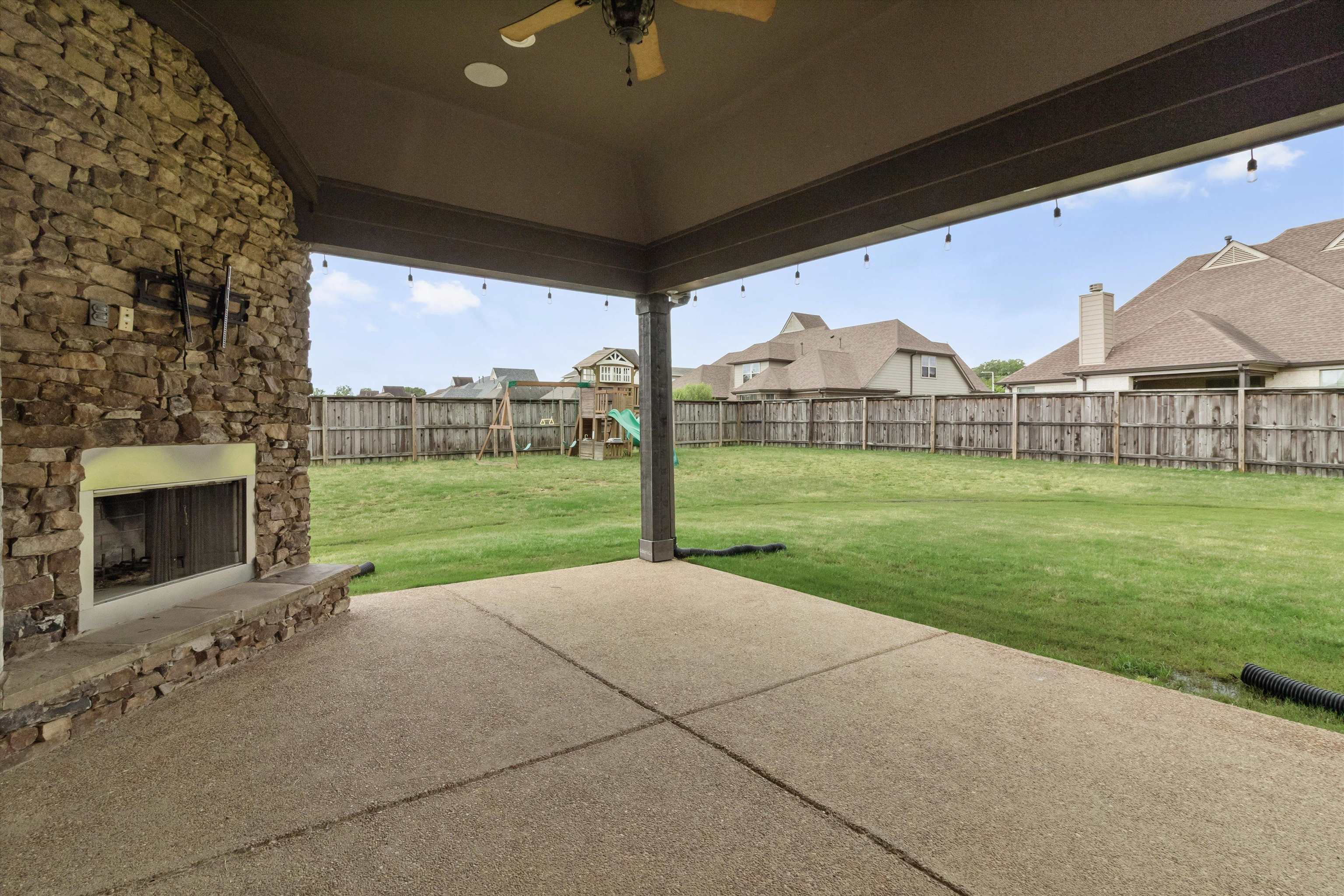 3449 Banyan Lane Bartlett, TN 38133 - Photo 33 of 35 a view of a house with a big yard and a large tree