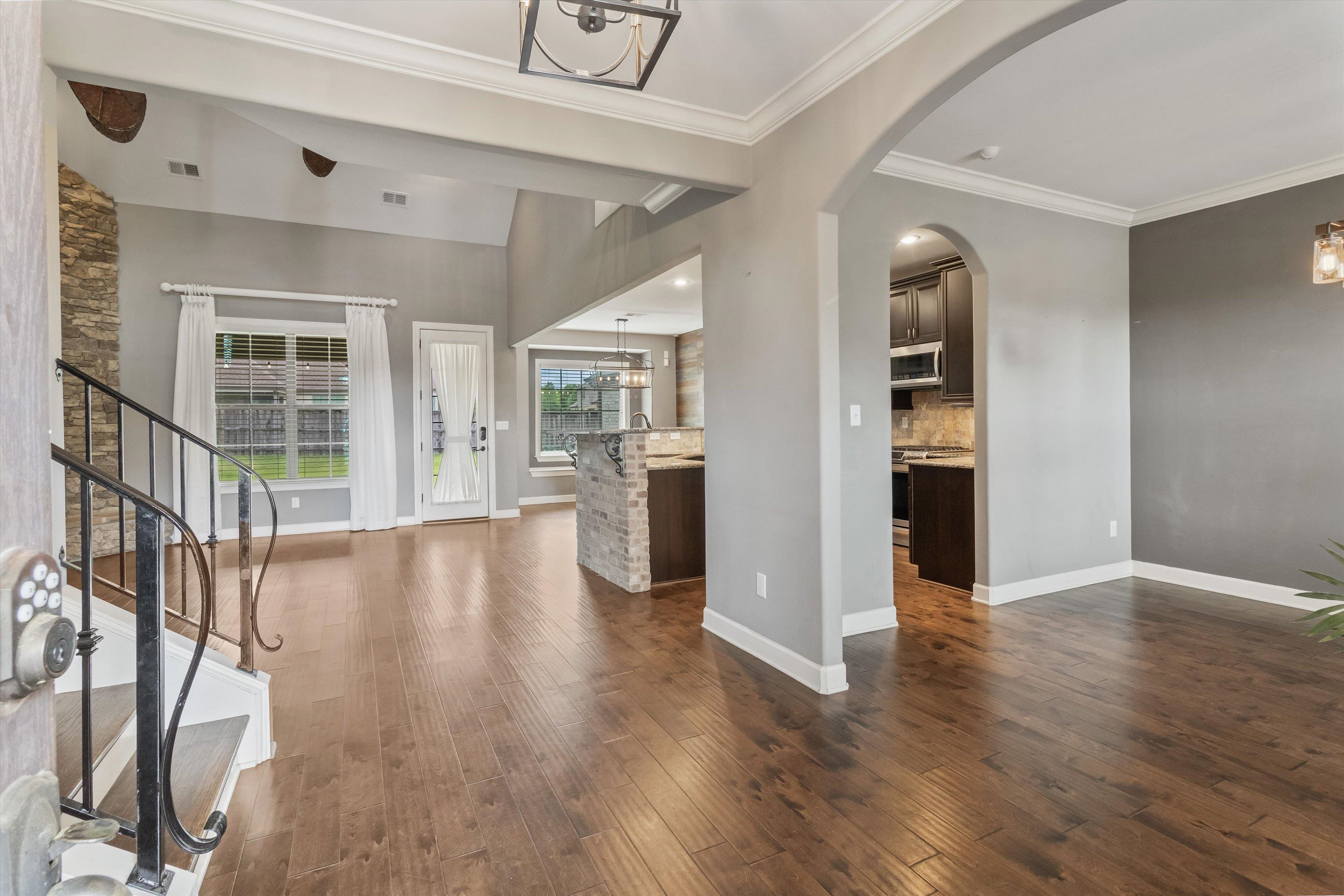 3449 Banyan Lane Bartlett, TN 38133 - Photo 4 of 35 wooden floor in an empty room with a workspace