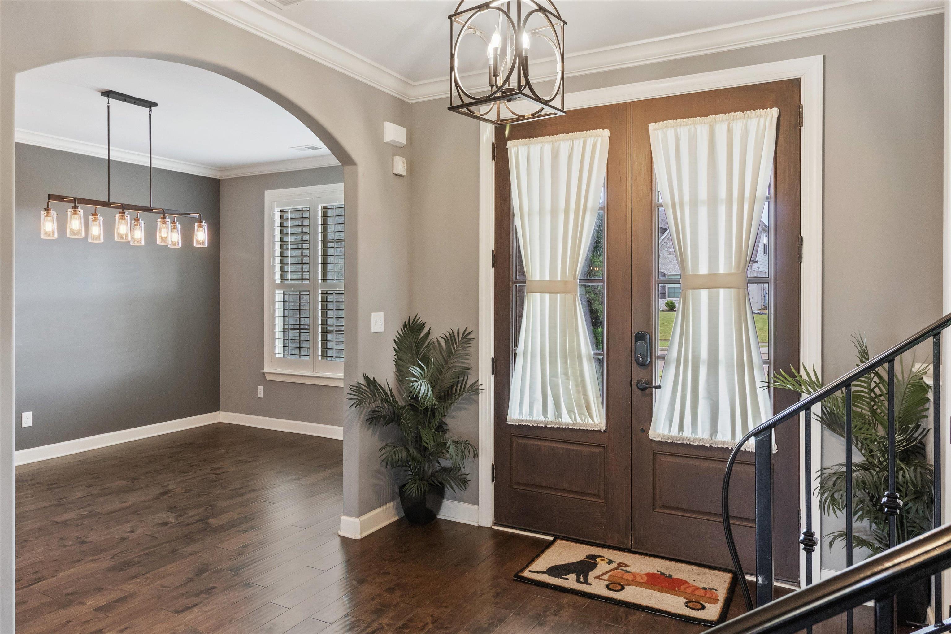 3449 Banyan Lane Bartlett, TN 38133 - Photo 5 of 35 a living room with wooden floor and windows