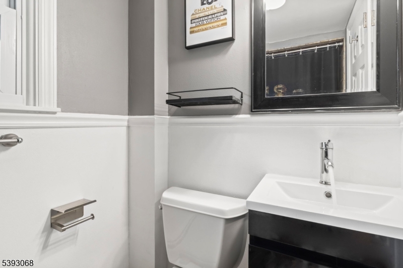 88 Stanhope Sparta Road Sparta, NJ 07871 - Photo 14 of 29 a bathroom with a sink a toilet and mirror