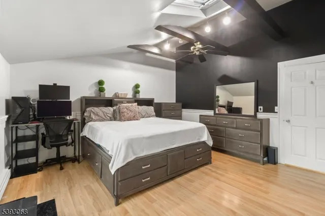 a bedroom with a bed and furniture