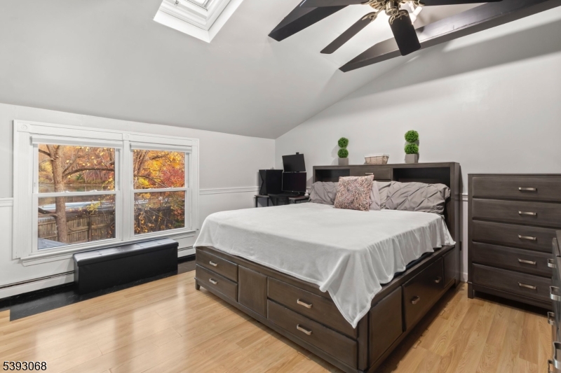 88 Stanhope Sparta Road Sparta, NJ 07871 - Photo 16 of 29 a spacious bedroom with a bed and a large window