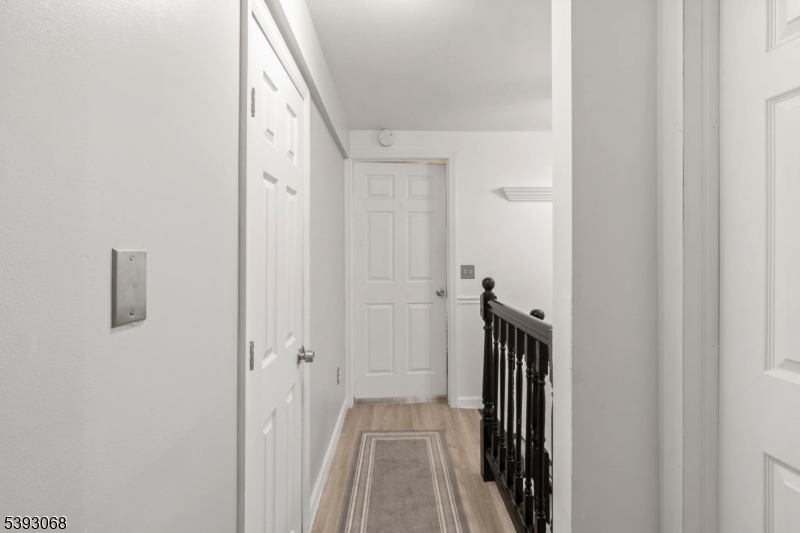 88 Stanhope Sparta Road Sparta, NJ 07871 - Photo 18 of 29 a view of a hallway with wooden floor and staircase