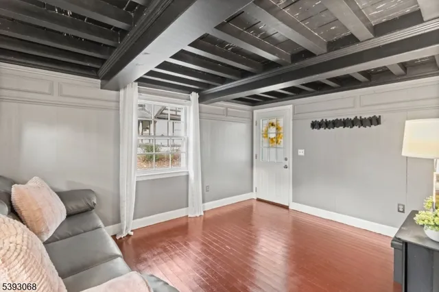 a view of livingroom with wooden floor