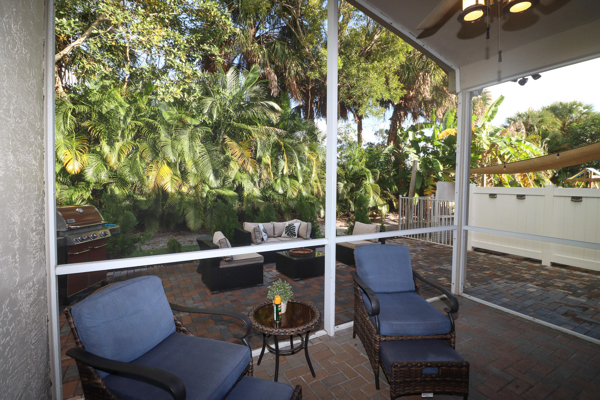 5790 Raceway Road Lake Worth, FL 33449 - Photo 32 of 48 Coverend Screened Patio