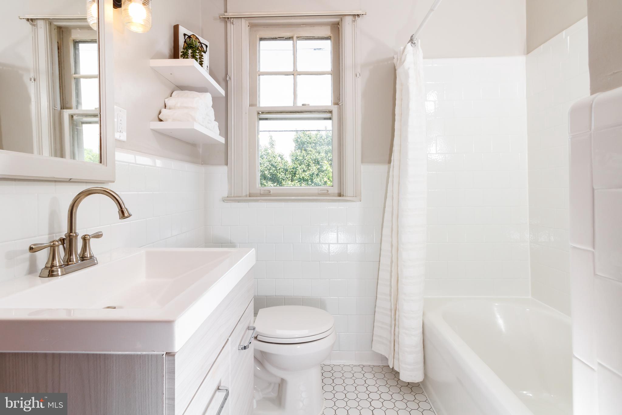 620 Silver Spring Avenue Silver Spring, MD 20910 - Photo 18 of 30 Sparkling upstairs bathroom!