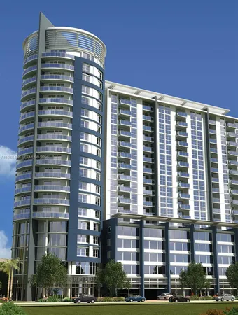 a front view of a building with glass windows