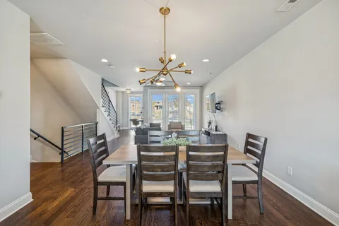 a view of a balcony with wooden floor