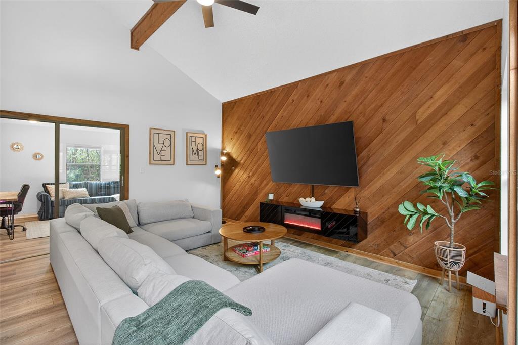 4925 Hamilton Road Lakeland, FL 33811 - Photo 21 of 71 a living room with furniture and a flat screen tv