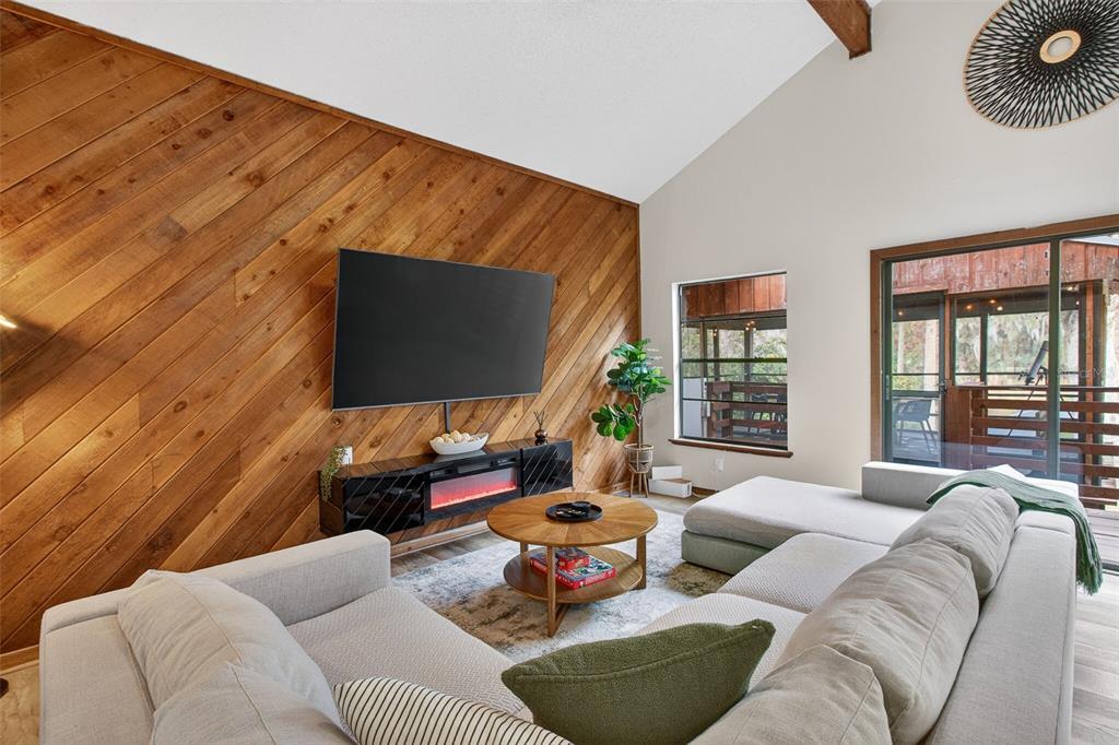 4925 Hamilton Road Lakeland, FL 33811 - Photo 22 of 71 a living room with furniture and a flat screen tv