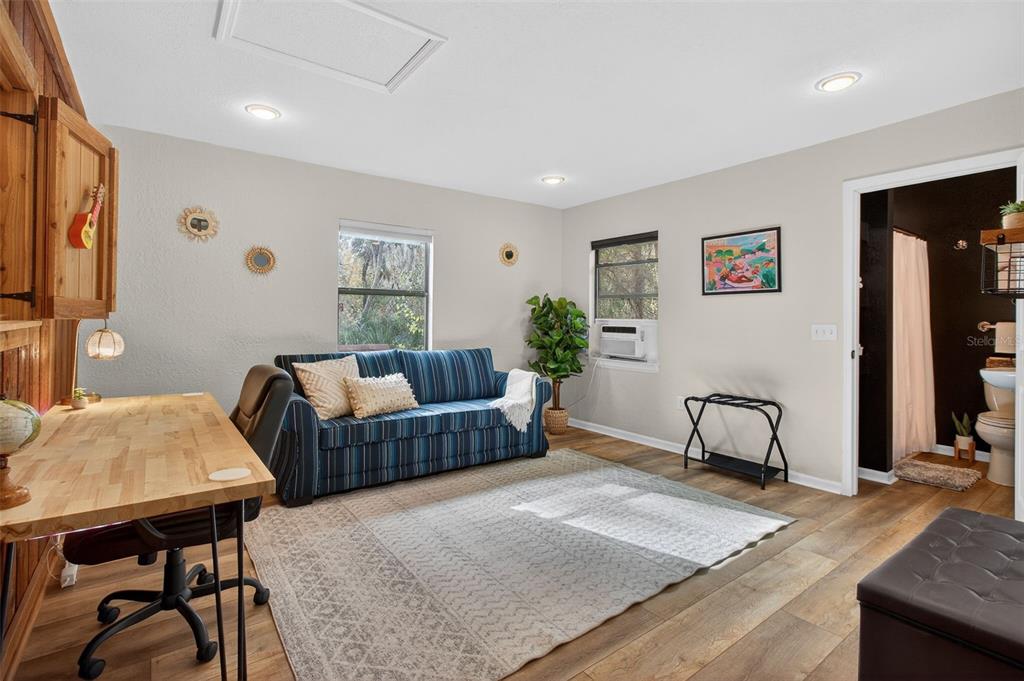 4925 Hamilton Road Lakeland, FL 33811 - Photo 33 of 71 a living room with furniture and a rug